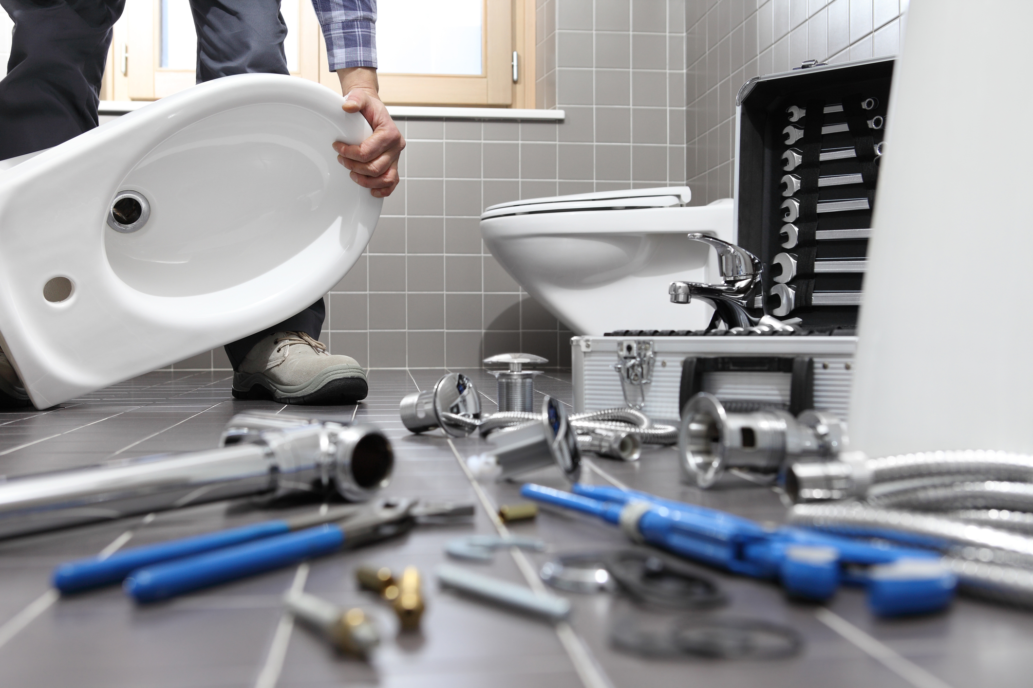 Bathroom Toilets Photo 114657204 / Plumber © Visivasnc | Dreamstime.com